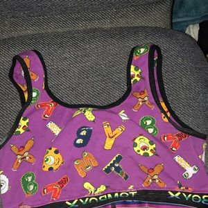 Tomboyx sports bra with glow in the dark lettering